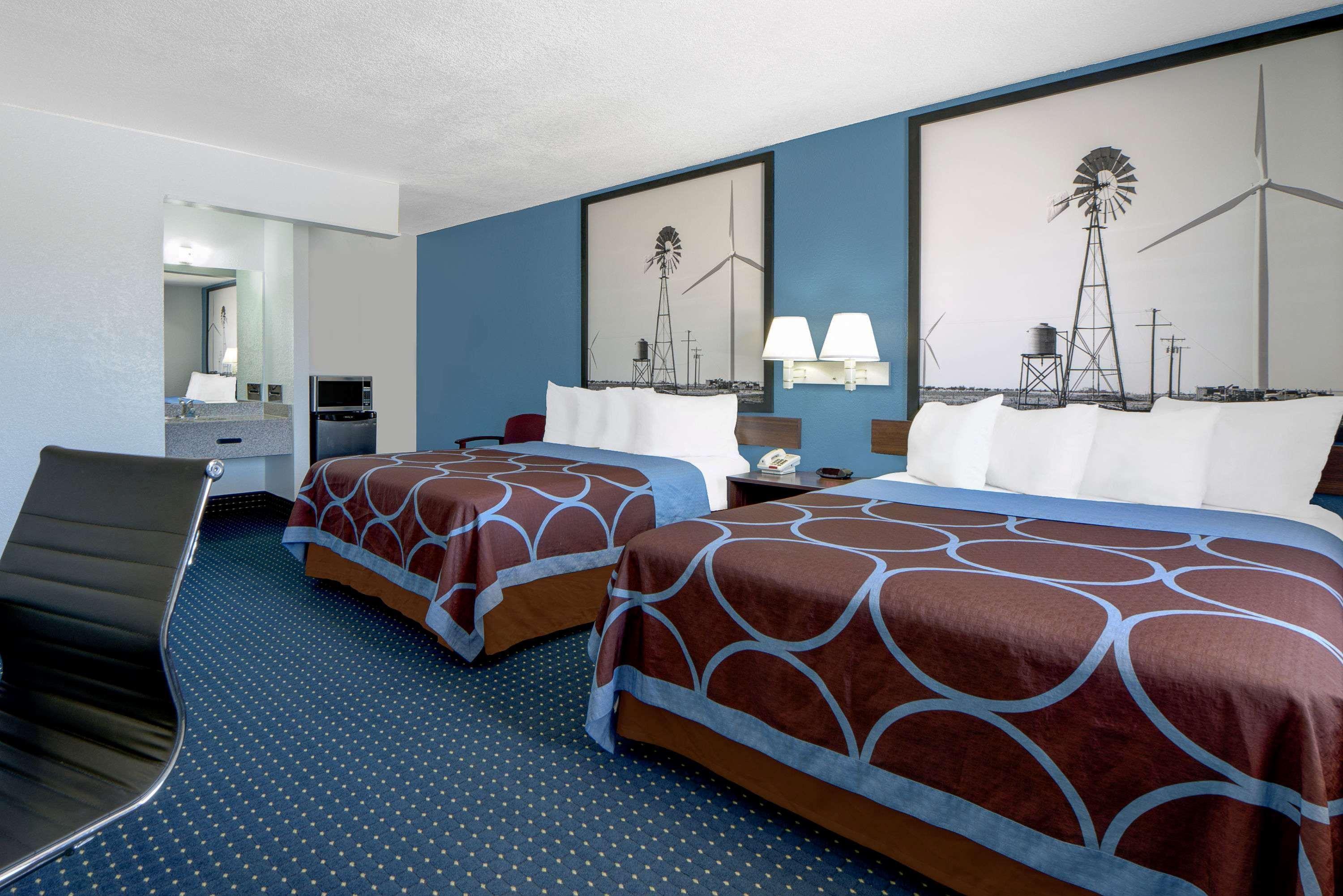 Motel Super 8 By Wyndham Dumas Tx Esterno foto