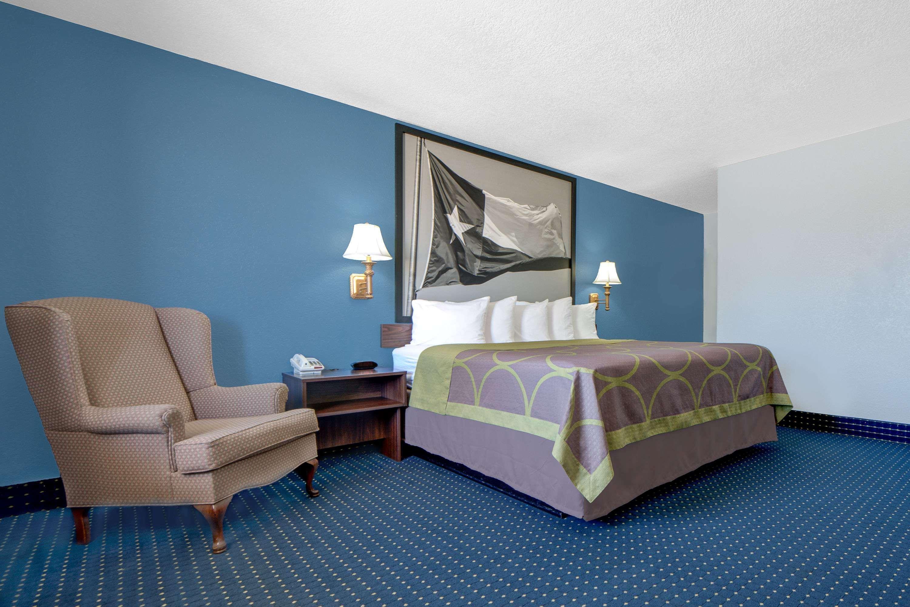 Motel Super 8 By Wyndham Dumas Tx Esterno foto